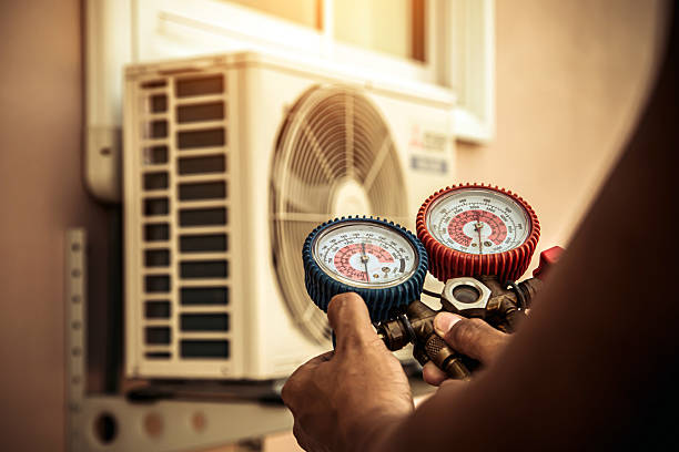 Professional Ductwork Repair technician working in Hartly, DE